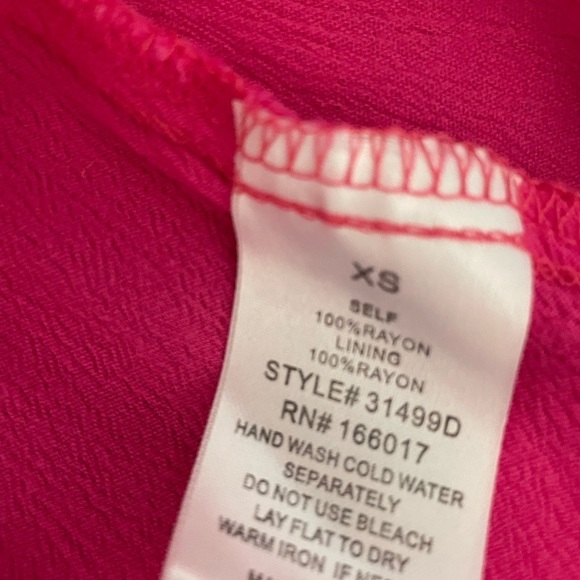 MF Designs high-low smock waist tiered ruffle skirt in pink. Size X-Small - Picture 7 of 7